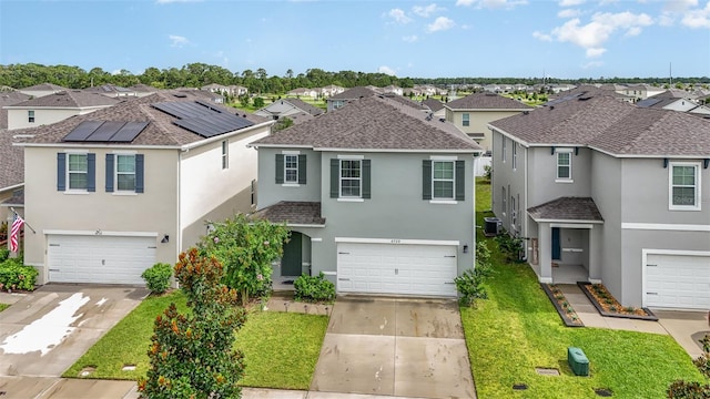 6728 Huntleigh Hammock Rd, Harmony, FL 34773 - traditional-style home with a residential view, a garage, and driveway
