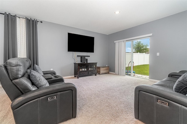 6728 Huntleigh Hammock Rd, Harmony, FL 34773 - carpeted living room with baseboards and recessed lighting