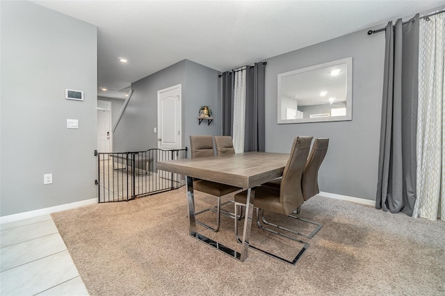 6728 Huntleigh Hammock Rd, Harmony, FL 34773 - tiled dining room with baseboards, carpet, and recessed lighting