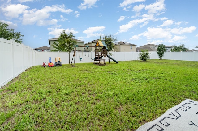 view of yard with a playground