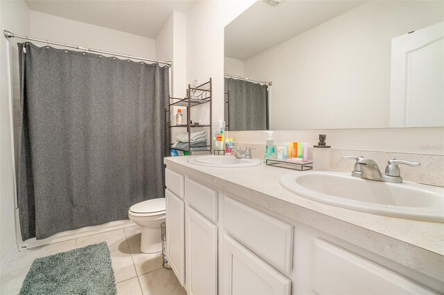 6728 Huntleigh Hammock Rd, Harmony, FL 34773 - full bath with toilet, tile patterned flooring, double vanity, and curtained shower