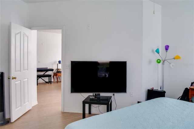 bedroom featuring light wood-type flooring