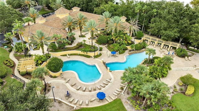 view of swimming pool with a patio