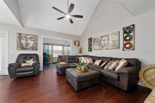 living room with dark wood-type flooring, ceiling fan, and high vaulted ceiling