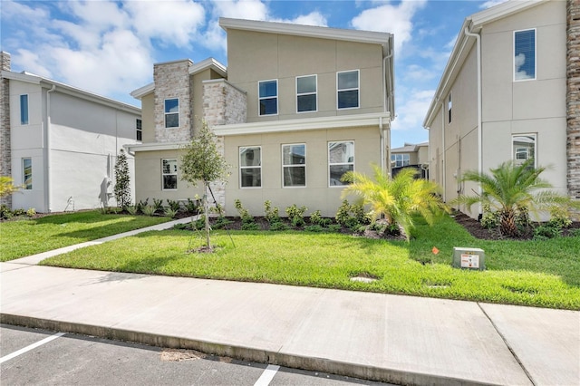 view of front of house with a front yard