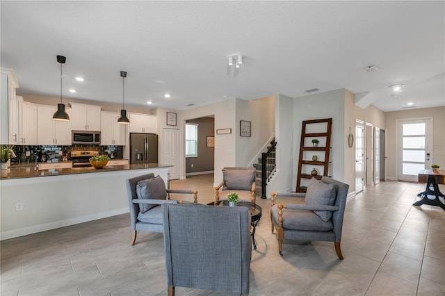 living room featuring light tile patterned floors