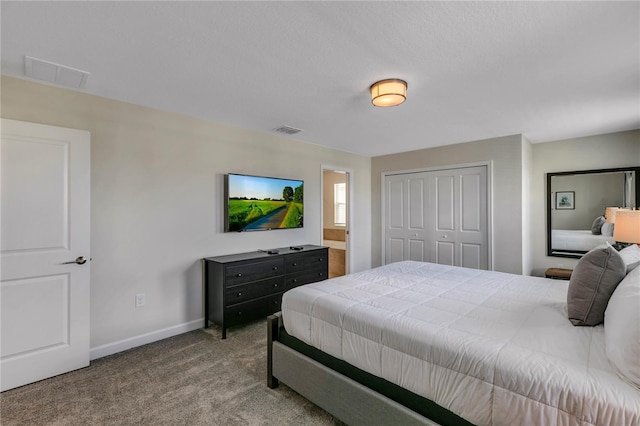 carpeted bedroom with a closet