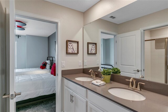 bathroom with vanity and walk in shower