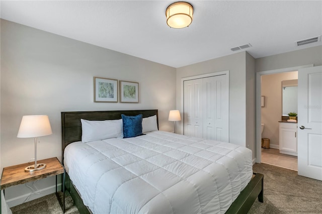 bedroom with carpet flooring and a closet