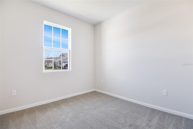 empty room featuring carpet flooring