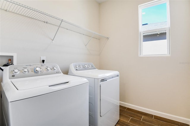 washroom featuring washer and dryer