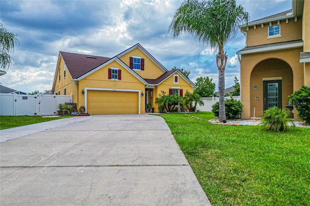 view of front facade featuring a garage and a front yard