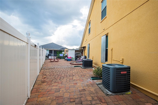 view of patio featuring central AC