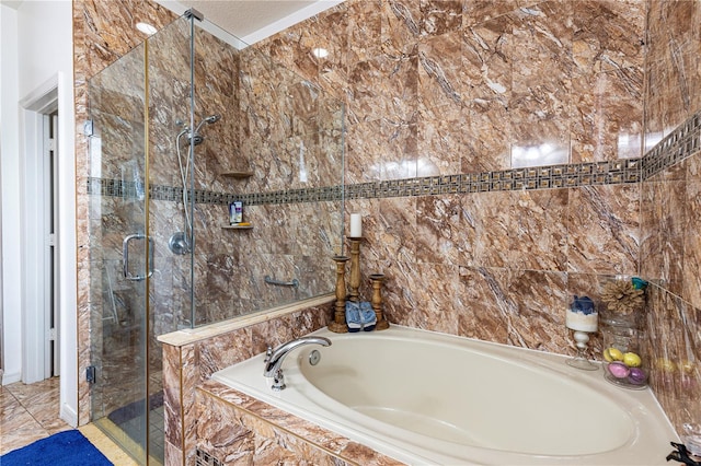 bathroom featuring tile walls, independent shower and bath, and tile patterned floors