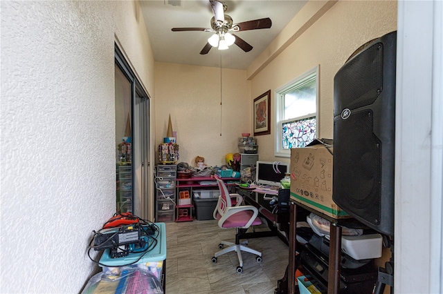 office area with ceiling fan