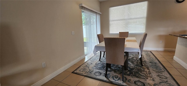 dining room with light tile patterned floors