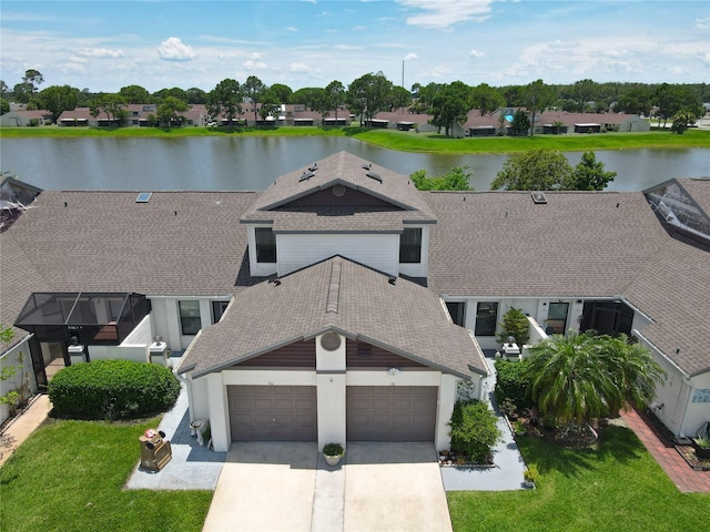 drone / aerial view featuring a water view