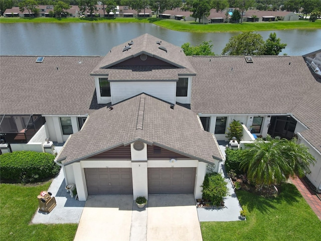 bird's eye view with a water view