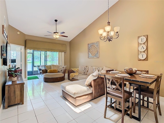 living room with light tile patterned floors, ceiling fan with notable chandelier, and high vaulted ceiling