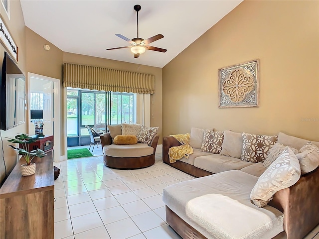 tiled living room featuring high vaulted ceiling and ceiling fan