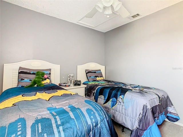 bedroom with ceiling fan and carpet