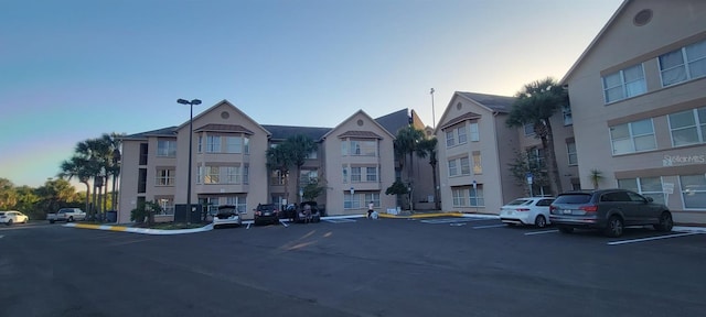 view of outdoor building at dusk