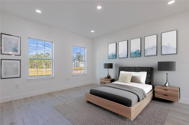 bedroom featuring light hardwood / wood-style floors