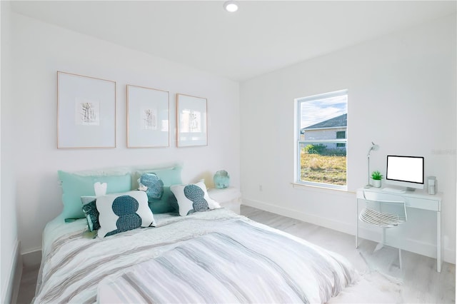 bedroom featuring light hardwood / wood-style floors