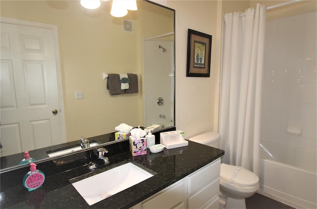 full bathroom with vanity, shower / bathtub combination with curtain, and toilet