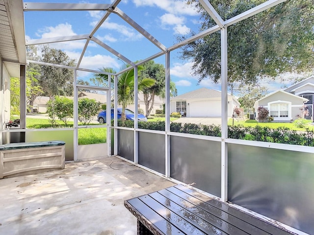 unfurnished sunroom with plenty of natural light