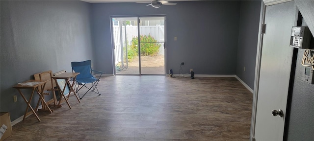 sitting room featuring ceiling fan