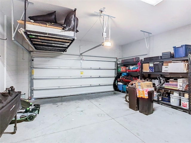 garage featuring a garage door opener