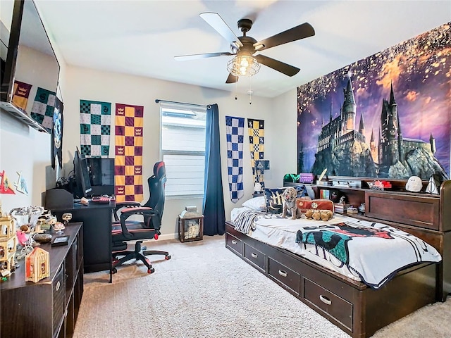 bedroom with carpet floors, ceiling fan, and baseboards