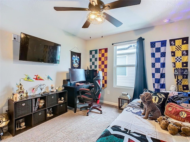 bedroom featuring a ceiling fan, carpet, and baseboards