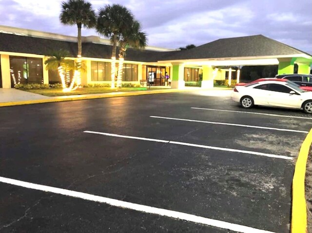 view of parking at dusk