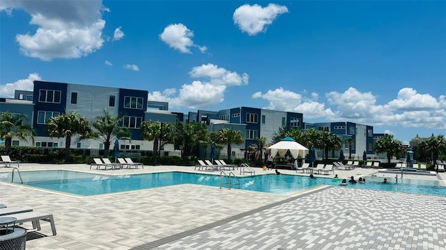 view of swimming pool featuring a patio