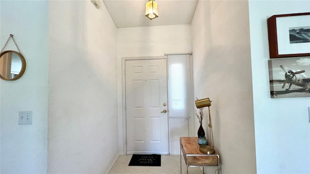 view of tiled entrance foyer