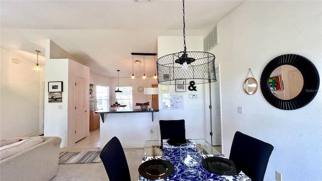 dining room with a chandelier