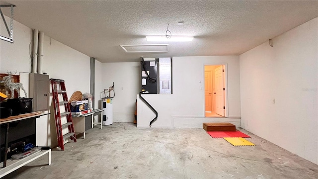 garage featuring water heater and heating unit