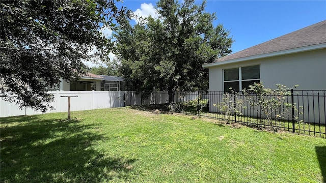 view of yard featuring a lanai