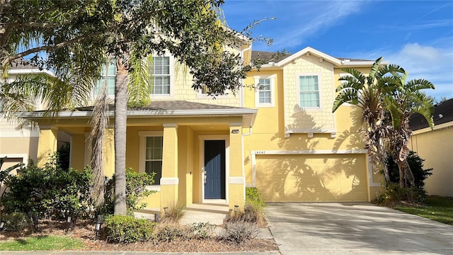 view of front of property with a garage