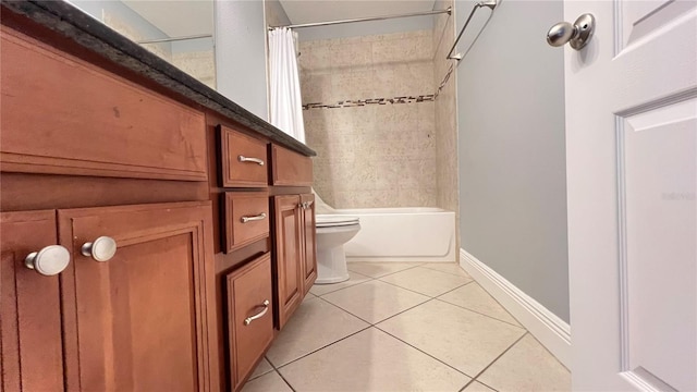 bathroom with tile patterned floors, toilet, and shower / bath combo with shower curtain