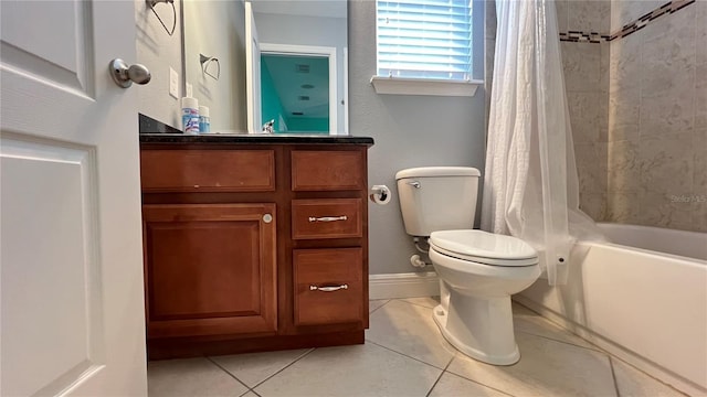 full bathroom with vanity, shower / tub combo, tile patterned floors, and toilet