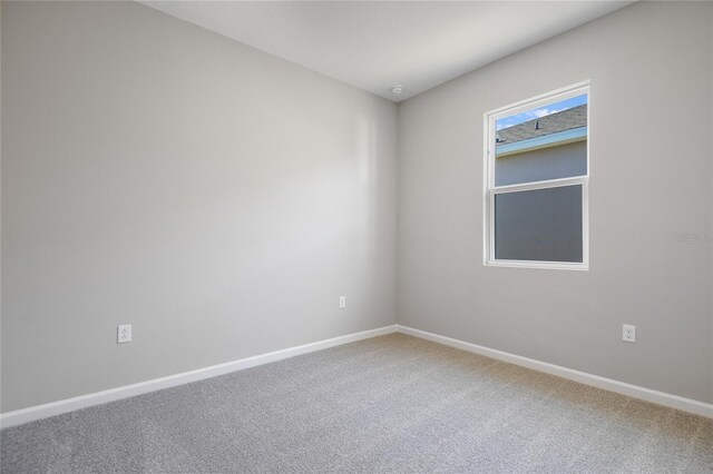 spare room with carpet flooring