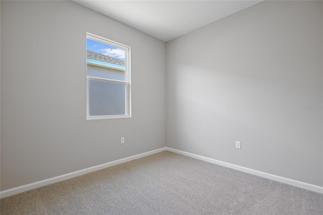 unfurnished room featuring carpet floors