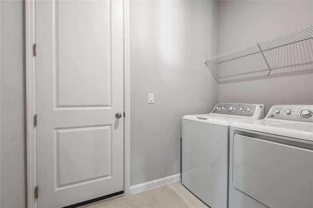 laundry area featuring independent washer and dryer