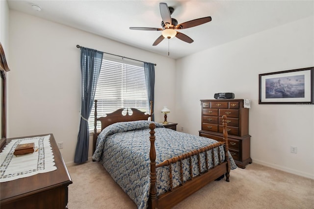742 San Joaquin Rd, Poinciana, FL 34759 - bedroom featuring light carpet, ceiling fan, and baseboards