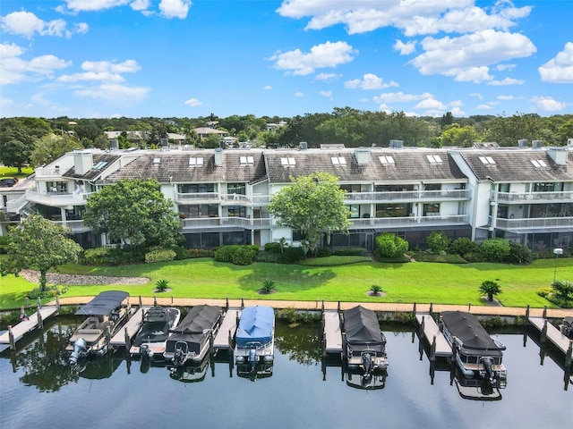 drone / aerial view with a water view