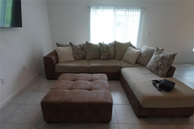 living room with light tile patterned floors