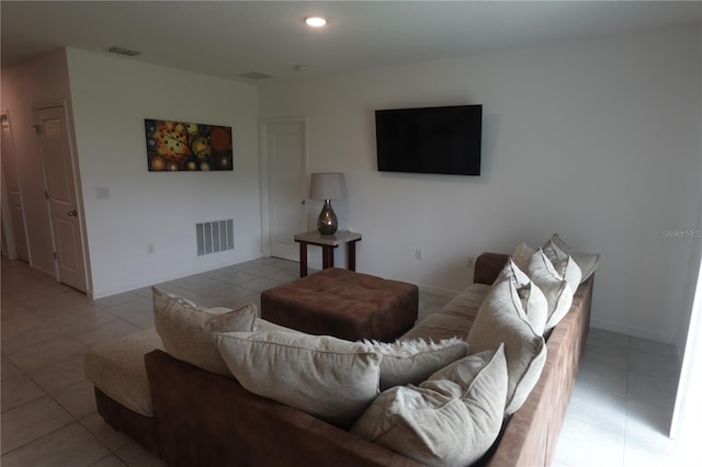 living room with light tile patterned floors